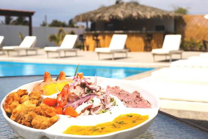 Imagen del bar/restaurante del Hotel Organos Beach. Foto 22