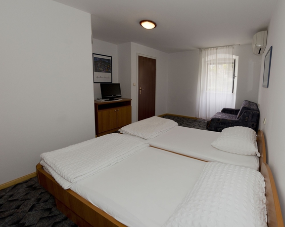 Imagen de la habitación del Hotel Orhan Rooms Dubrovnik. Foto 10