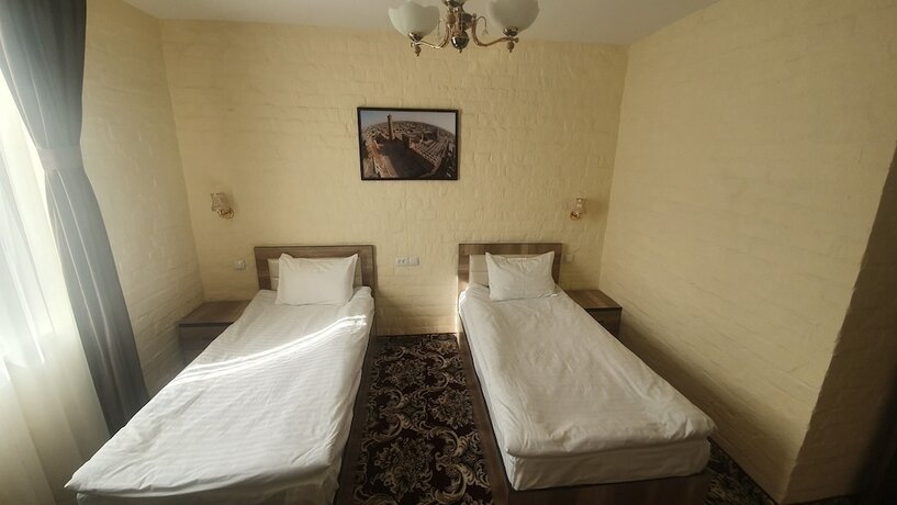 Imagen de la habitación del Hotel Orient Grand. Foto 14