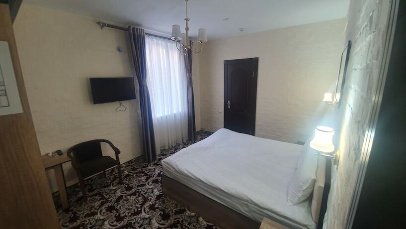 Imagen de la habitación del Hotel Orient Grand. Foto 15