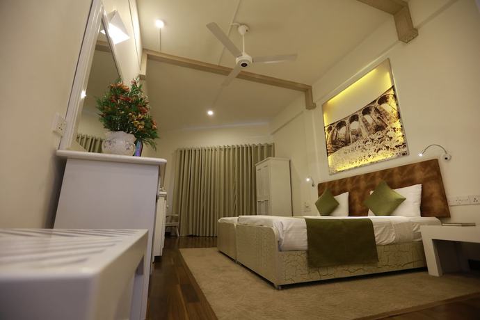 Imagen de la habitación del Hotel Orient, Kebillawela. Foto 2