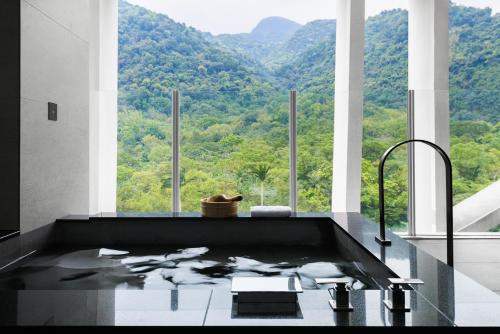 Imagen general del Hotel Orient Luxury-Jiaoxi. Foto 7