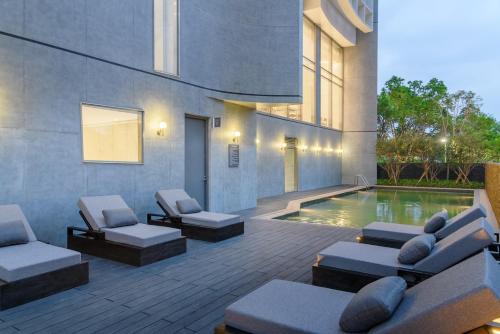 Imagen de la habitación del Hotel Orient Luxury-Jiaoxi. Foto 11