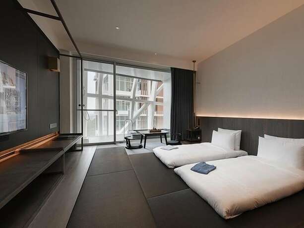Imagen de la habitación del Hotel Orient Luxury-jiao Xi. Foto 11