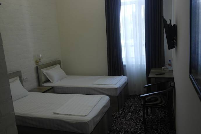 Imagen de la habitación del Hotel Orient Star. Foto 13
