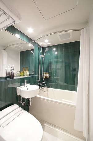 Imagen de la habitación del Hotel Oriental Express Osaka Shinsaibashi. Foto 13