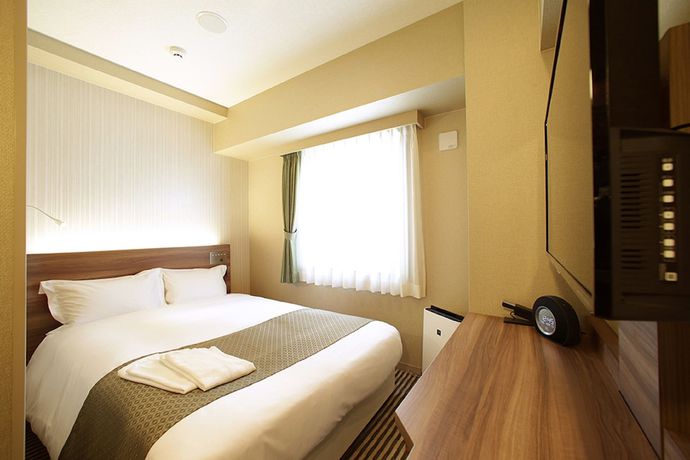 Imagen de la habitación del Hotel Oriental Express Osaka Shinsaibashi. Foto 15