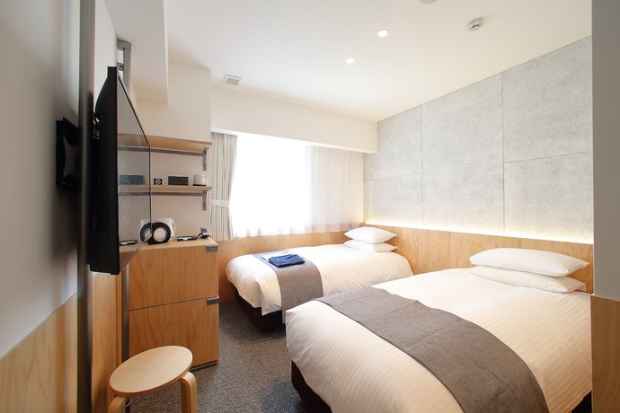 Imagen de la habitación del Hotel Oriental Express Tokyo Kamata. Foto 11