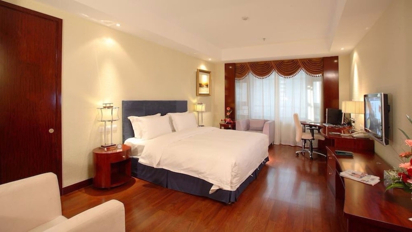 Imagen de la habitación del Hotel Oriental Garden. Foto 6