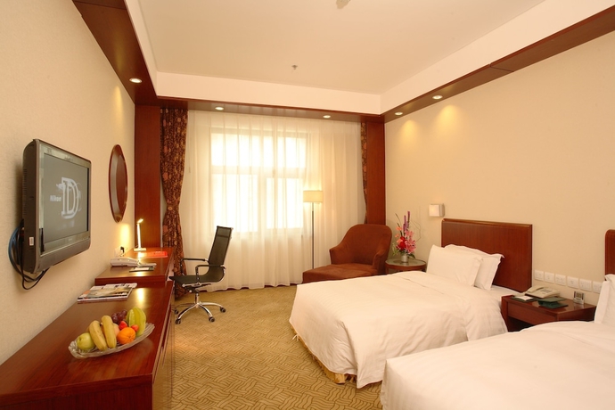 Imagen de la habitación del Hotel Oriental Garden. Foto 10