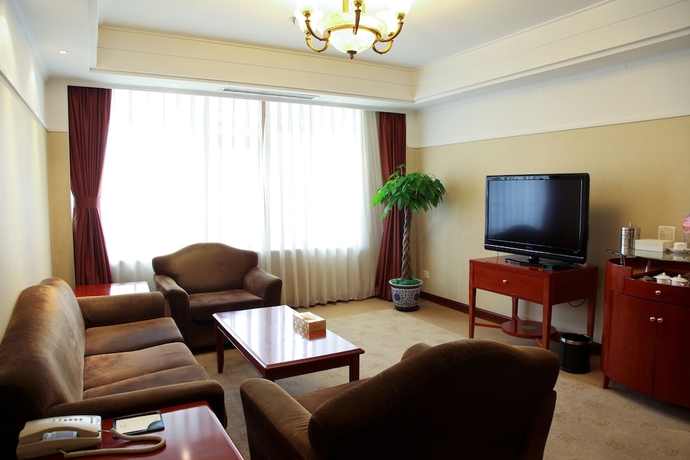 Imagen de la habitación del Hotel Oriental Garden. Foto 12