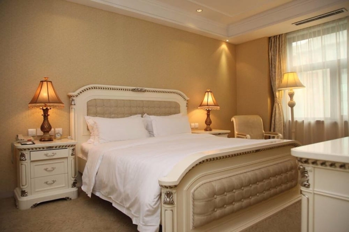 Imagen de la habitación del Hotel Oriental Garden. Foto 14