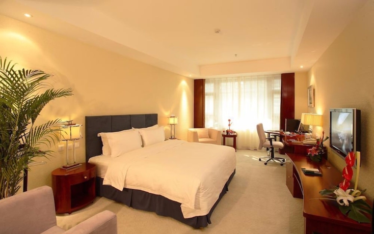 Imagen de la habitación del Hotel Oriental Garden. Foto 16