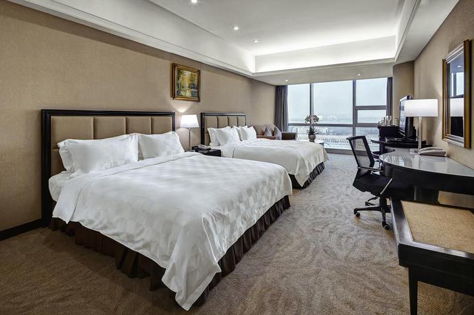 Imagen de la habitación del Hotel Oriental Ginza Shenzhen. Foto 2