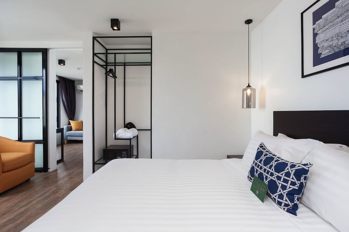 Imagen de la habitación del Hotel Oriental Heritage Residence. Foto 5