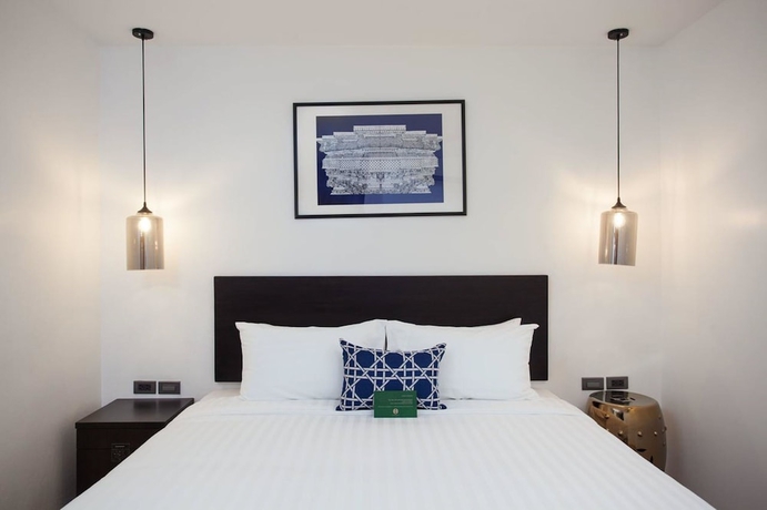 Imagen de la habitación del Hotel Oriental Heritage Residence. Foto 6