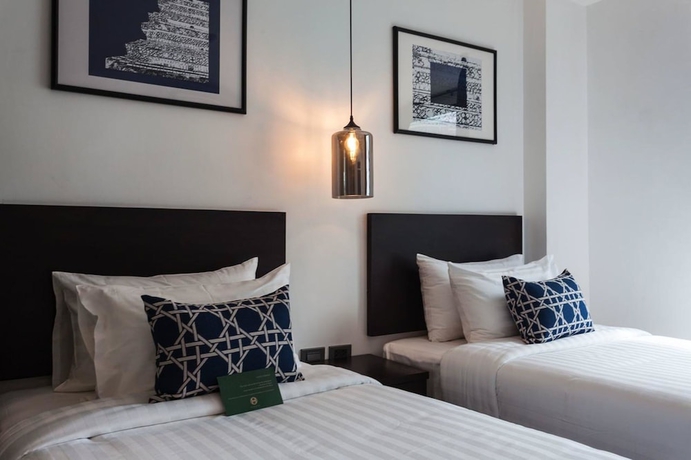 Imagen de la habitación del Hotel Oriental Heritage Residence. Foto 9