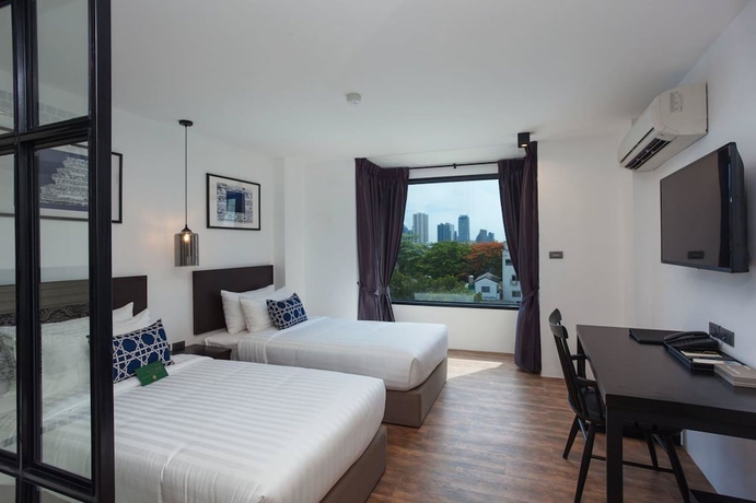 Imagen de la habitación del Hotel Oriental Heritage Residence. Foto 12