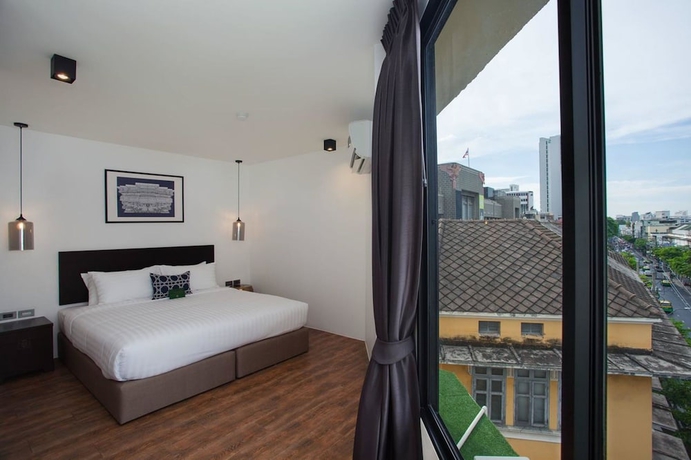 Imagen de la habitación del Hotel Oriental Heritage Residence. Foto 13