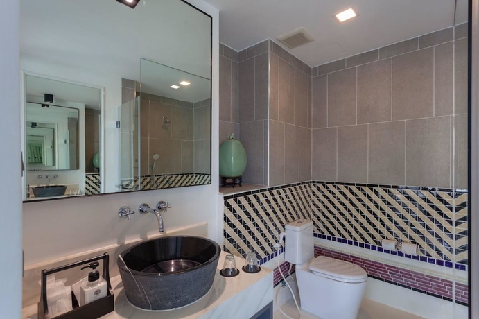 Imagen de la habitación del Hotel Oriental Heritage Residence. Foto 16