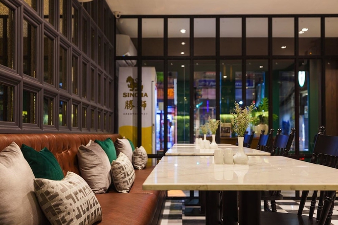 Imagen del bar/restaurante del Hotel Oriental Heritage Residence. Foto 4