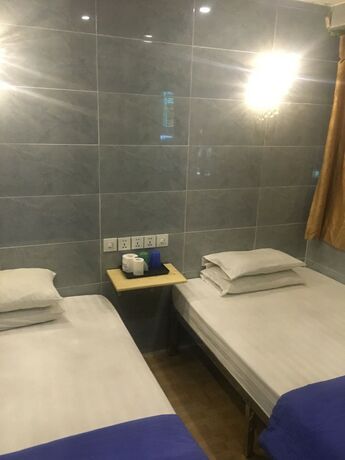 Imagen de la habitación del Hotel Oriental Pearl Hostel. Foto 14