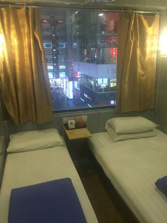 Imagen de la habitación del Hotel Oriental Pearl Hostel. Foto 16