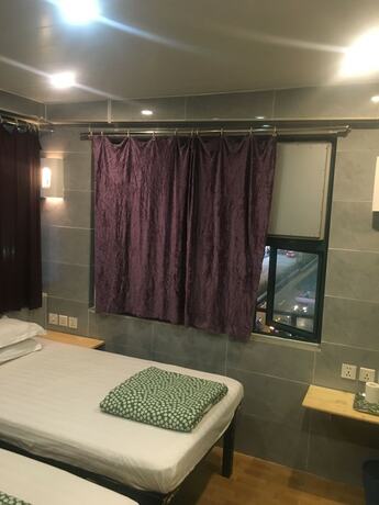 Imagen de la habitación del Hotel Oriental Pearl Hostel. Foto 17