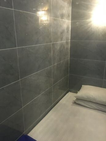Imagen de la habitación del Hotel Oriental Pearl Hostel. Foto 20