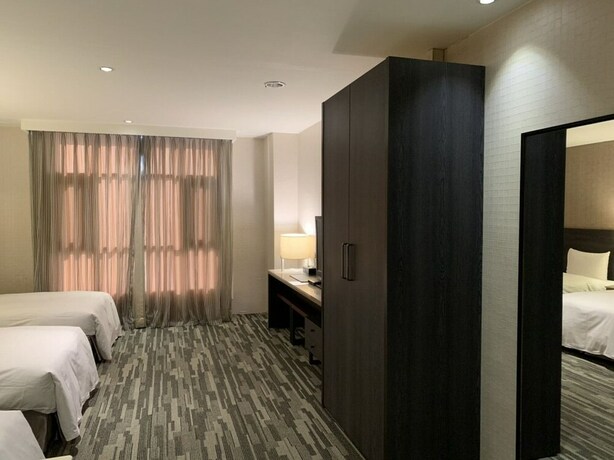 Imagen de la habitación del Hotel Oriental Pearl International. Foto 21