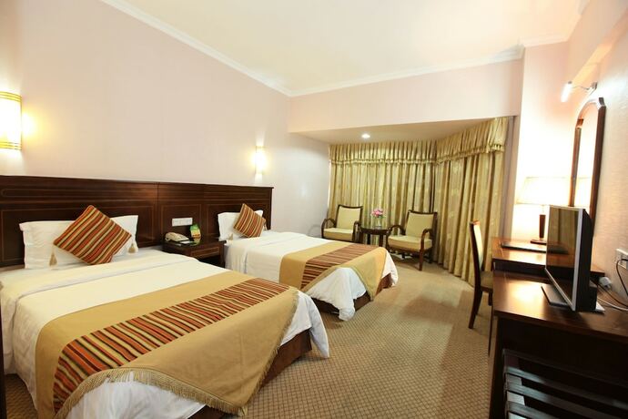 Imagen de la habitación del Hotel Oriental Silk - Guangzhou. Foto 11