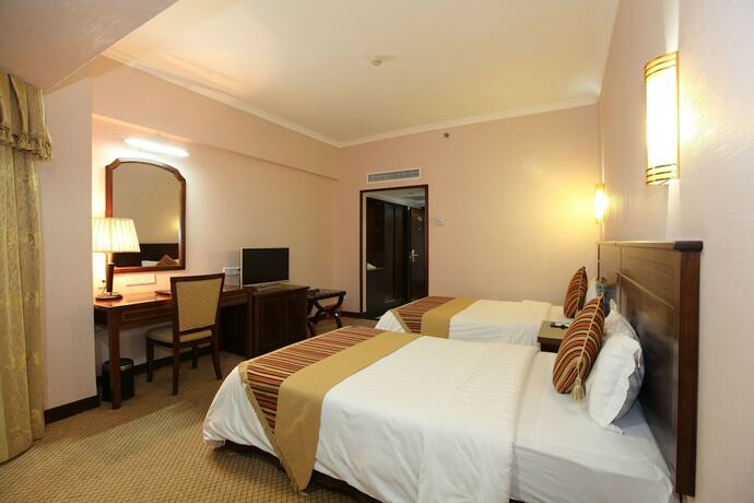 Imagen de la habitación del Hotel Oriental Silk - Guangzhou. Foto 12