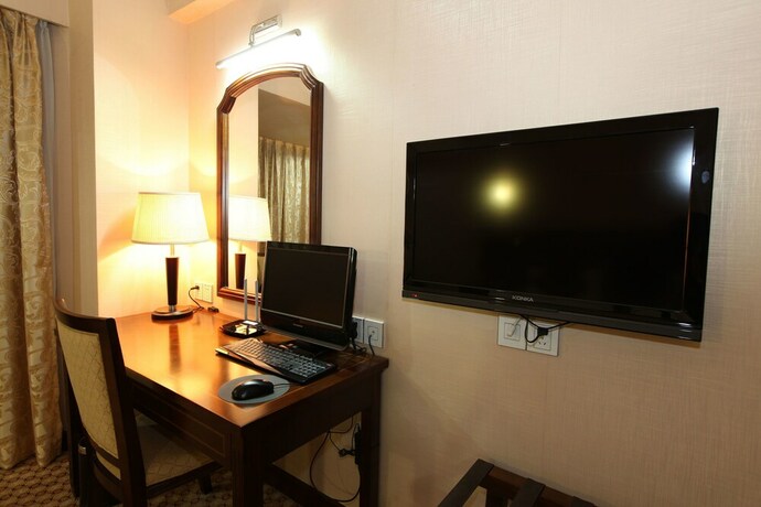 Imagen de la habitación del Hotel Oriental Silk - Guangzhou. Foto 22