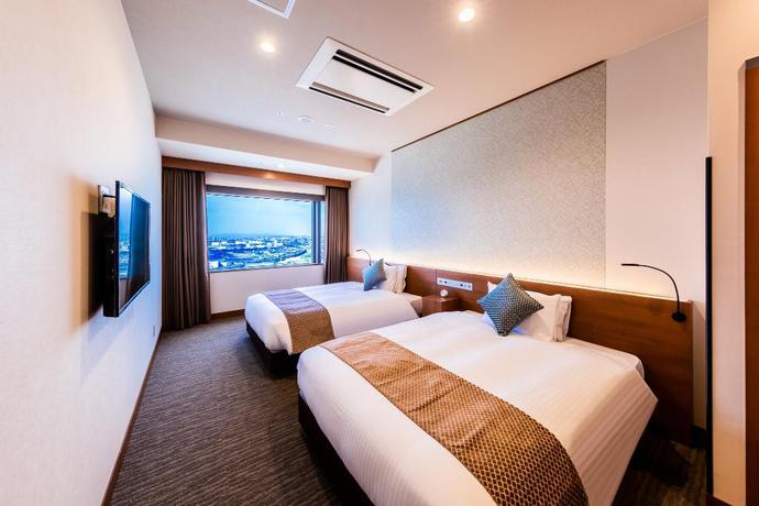 Imagen de la habitación del Hotel Oriental Suites Airport Osaka Rinku. Foto 8