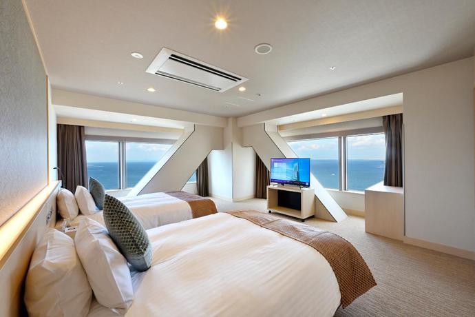 Imagen de la habitación del Hotel Oriental Suites Airport Osaka Rinku. Foto 9