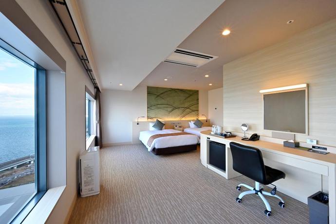 Imagen de la habitación del Hotel Oriental Suites Airport Osaka Rinku. Foto 11