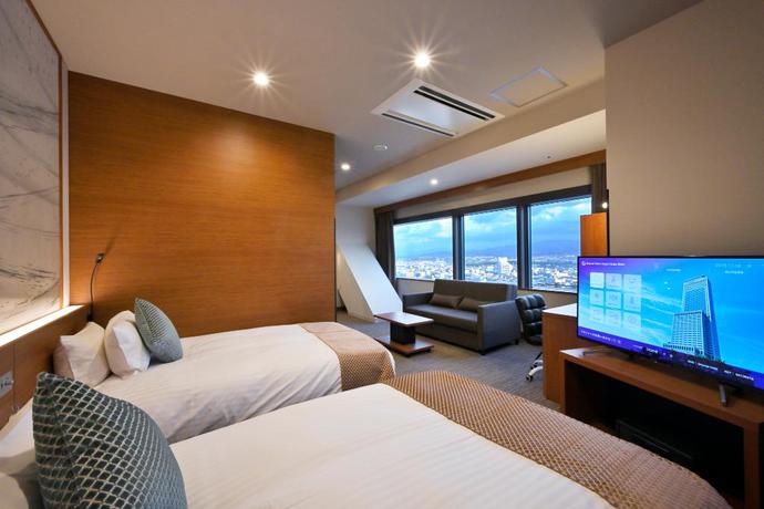 Imagen de la habitación del Hotel Oriental Suites Airport Osaka Rinku. Foto 12