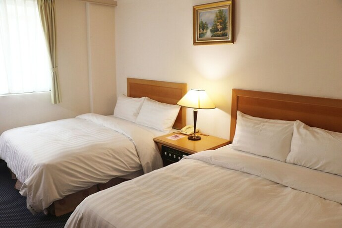 Imagen de la habitación del Hotel Oriental, Tainan. Foto 18