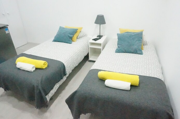 Imagen de la habitación del Hotel Oriente DNA Studios and Rooms. Foto 15