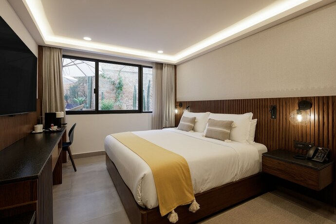 Imagen de la habitación del Hotel Origen 438 Luxury Boutique. Foto 15