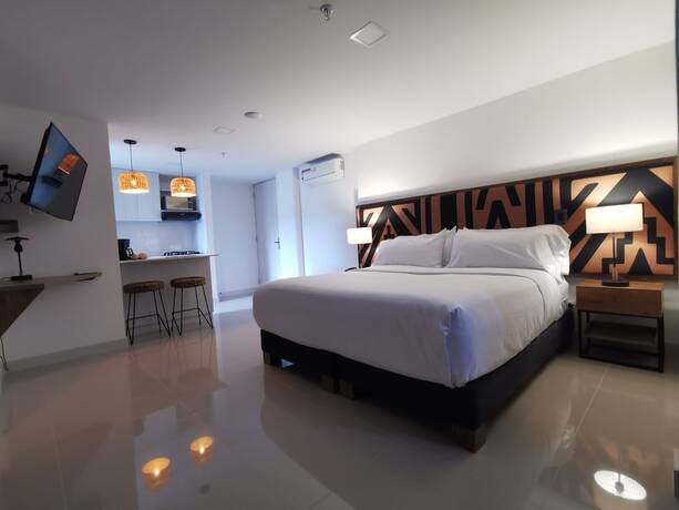 Imagen de la habitación del Hotel Origen Local Suites. Foto 13