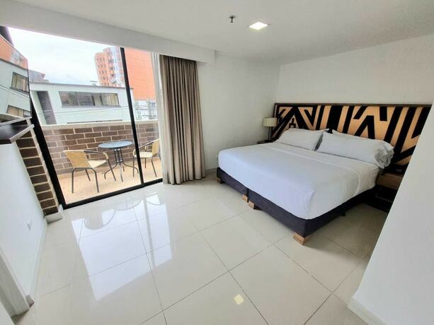 Imagen de la habitación del Hotel Origen Local Suites. Foto 17