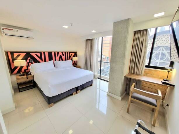 Imagen de la habitación del Hotel Origen Local Suites. Foto 19