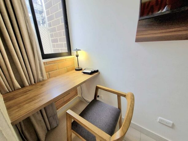 Imagen de la habitación del Hotel Origen Local Suites. Foto 20