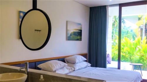 Imagen de la habitación del Hotel Origin Lombok. Foto 8