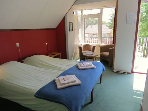 Imagen de la habitación del Hotel Orion, LISSE. Foto 9