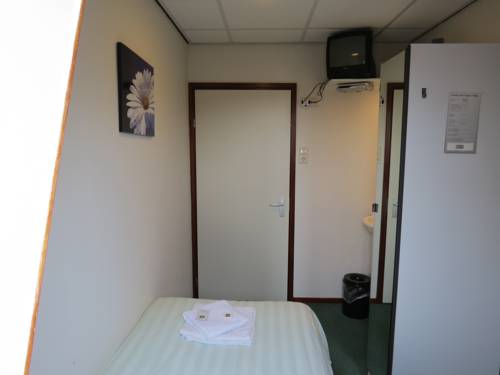 Imagen de la habitación del Hotel Orion, LISSE. Foto 11