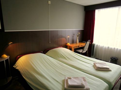 Imagen de la habitación del Hotel Orion, LISSE. Foto 14