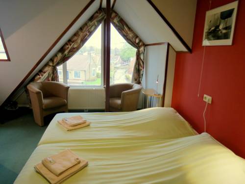 Imagen de la habitación del Hotel Orion, LISSE. Foto 15