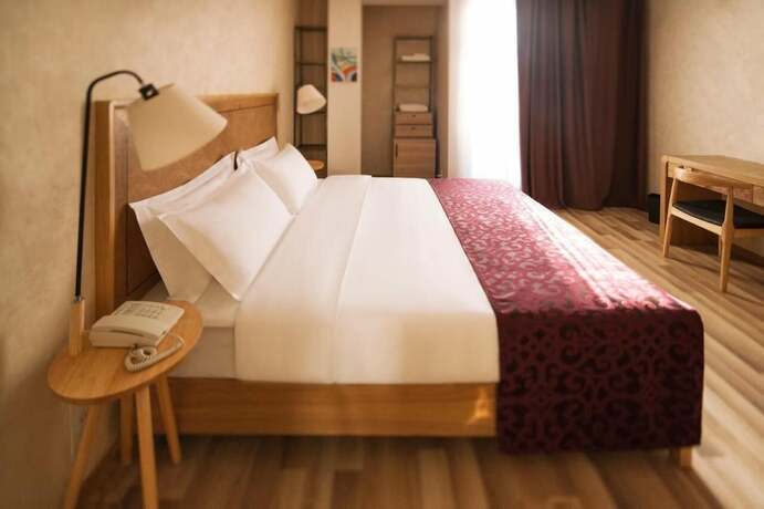 Imagen de la habitación del Hotel Ornament Boutique. Foto 15